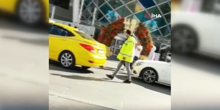 Ticari taksi sürücüleri ile değnekçinin para pazarlığı kamerada