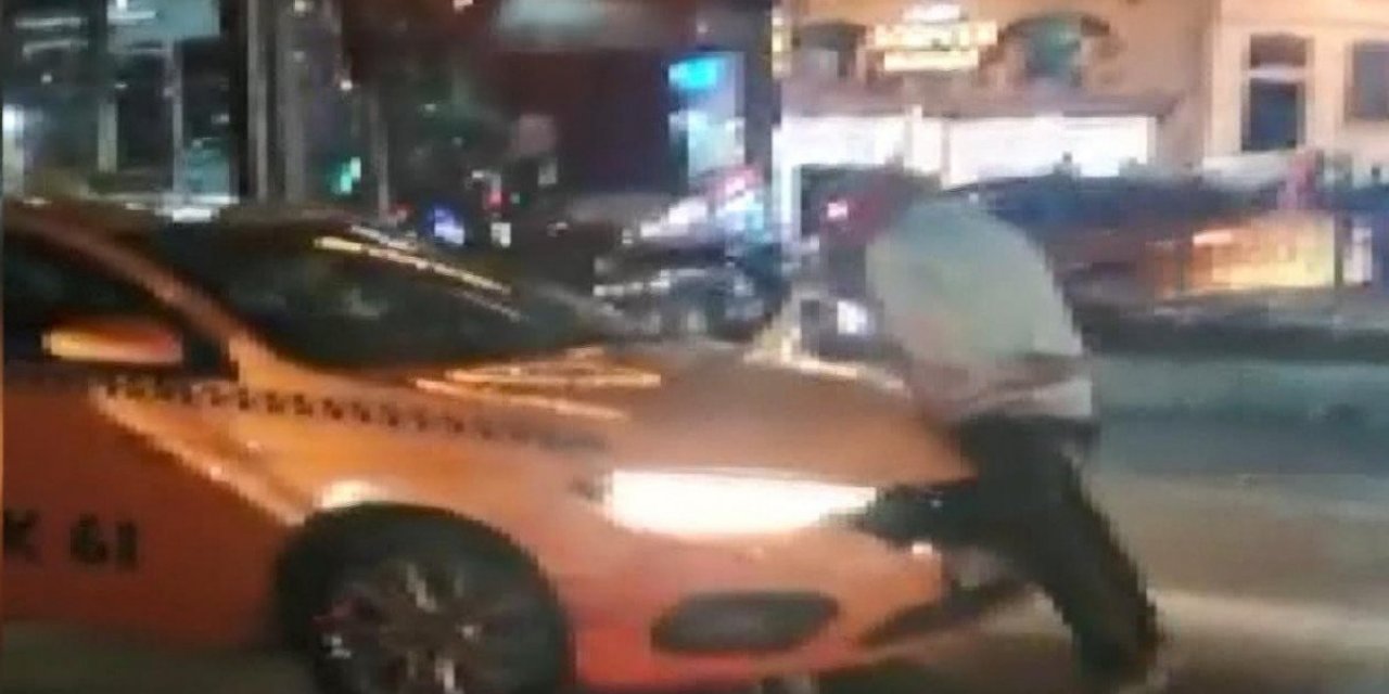 Beyoğlu'nda alınmadığı taksinin üzerine çıktı