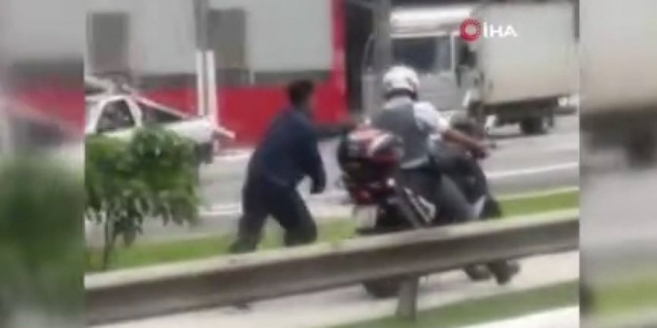 Brezilya’da polis, siyahi şüpheliyi motoruna kelepçeleyip koşturdu