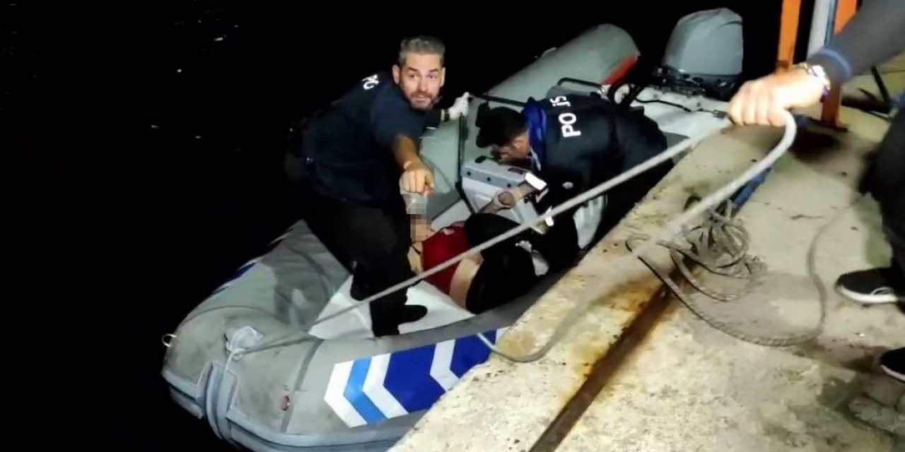 Antalya'da kıyafetleriyle denizde çığlık atan kadın kurtarıldı