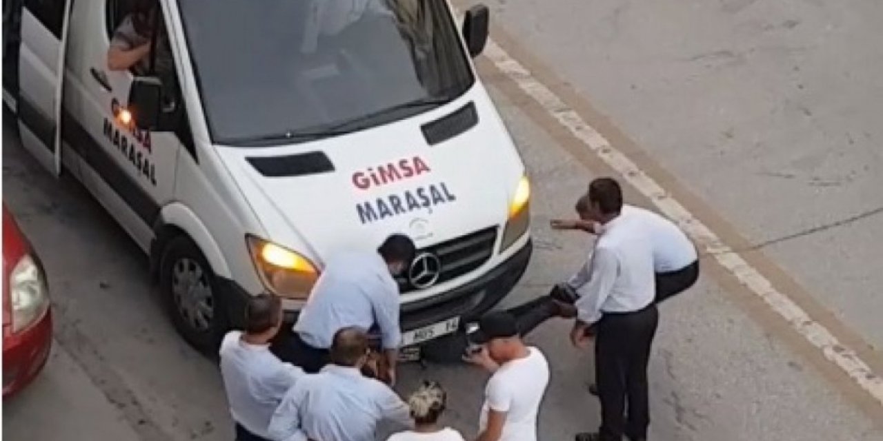 Ankara’da market fişi yüzünden servisten indirilince aracın altına girdi