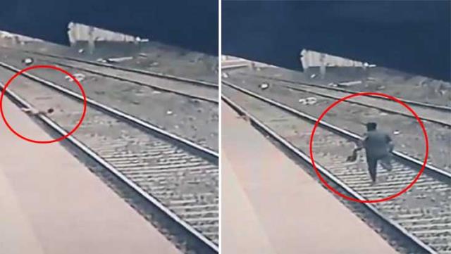 Raylara düşen çocuğu canını hiçe sayarak kurtardı!