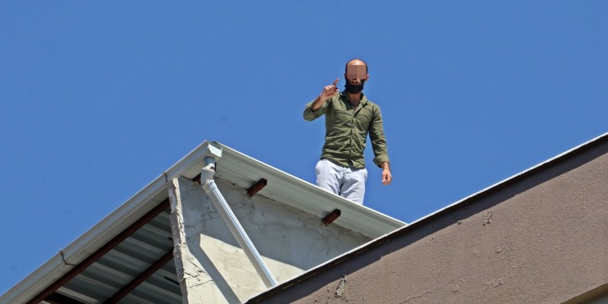 Temaslı adam çatıda polise 7 saat ecel terleri döktürdü