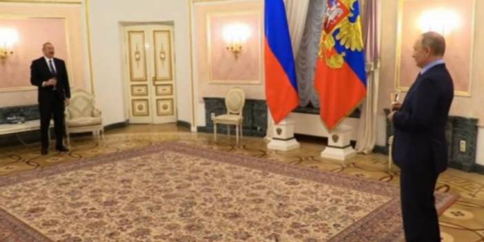 Aliyev ve Putin imzaladıkları işbirliği anlaşmasını şampanya içerek kutladı
